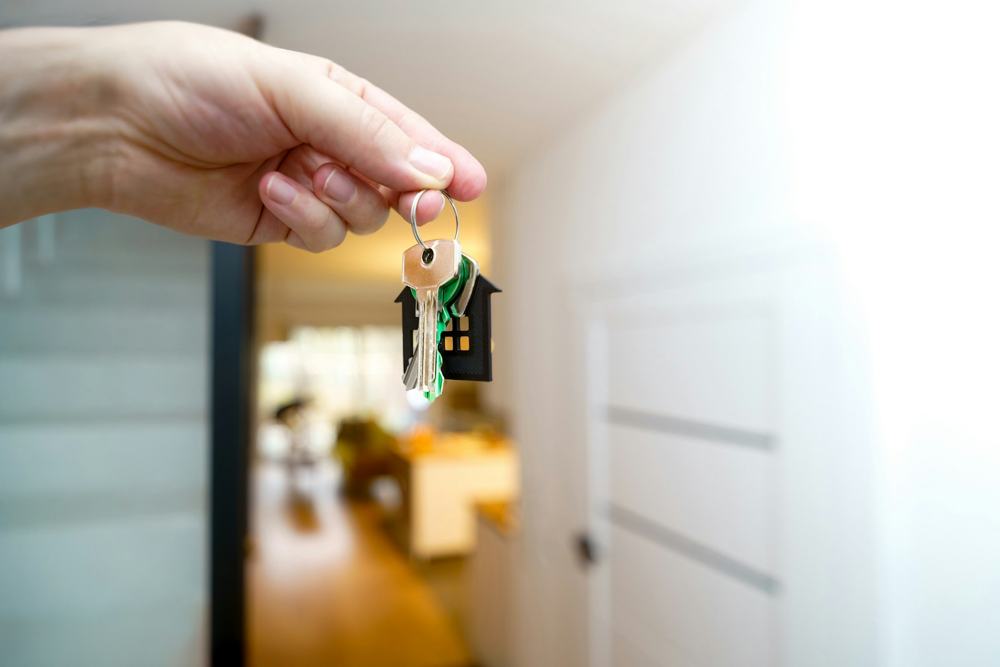 Keys to an apartment being handed over